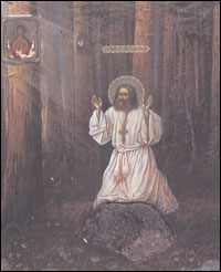 St. Seraphim prays on a rock.