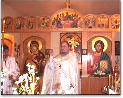 Father Rostislav serves on the day of Pascha.